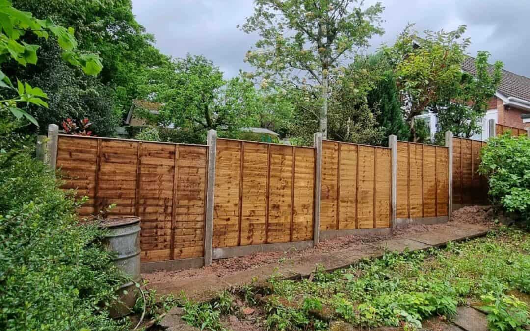 12 meters of 6×5 fence panels with concrete posts and kick boards in Cwmbran